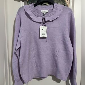 *SOLD*Free assembly lavender sweater sz L